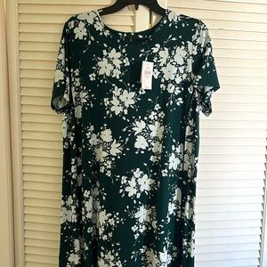 Dress green garment floral pattern with white flowers and small floral elements